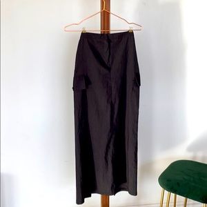 Mid length grey slim fitting ladies skirt.